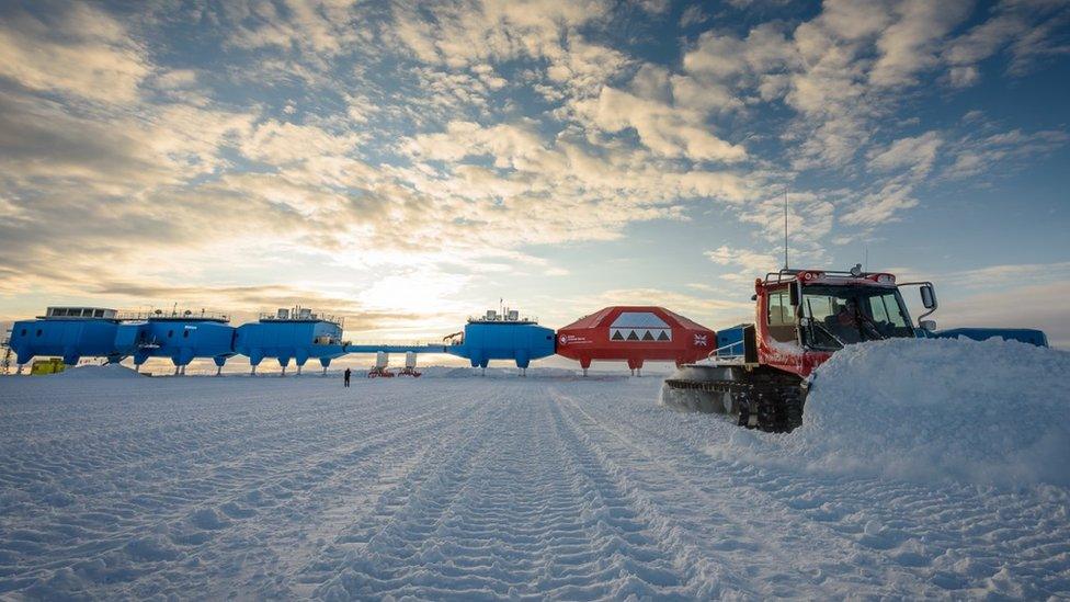 Mike Neaverson, from Goole, behind the wheel of a snow-clearing bulldozer at Halley