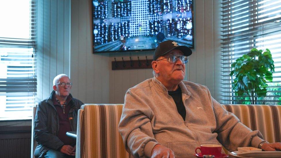 Some people visited pubs to watch the funeral service