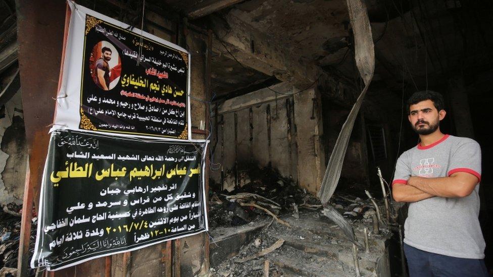 Funeral banners were posted at the site of the bombing, 4 July