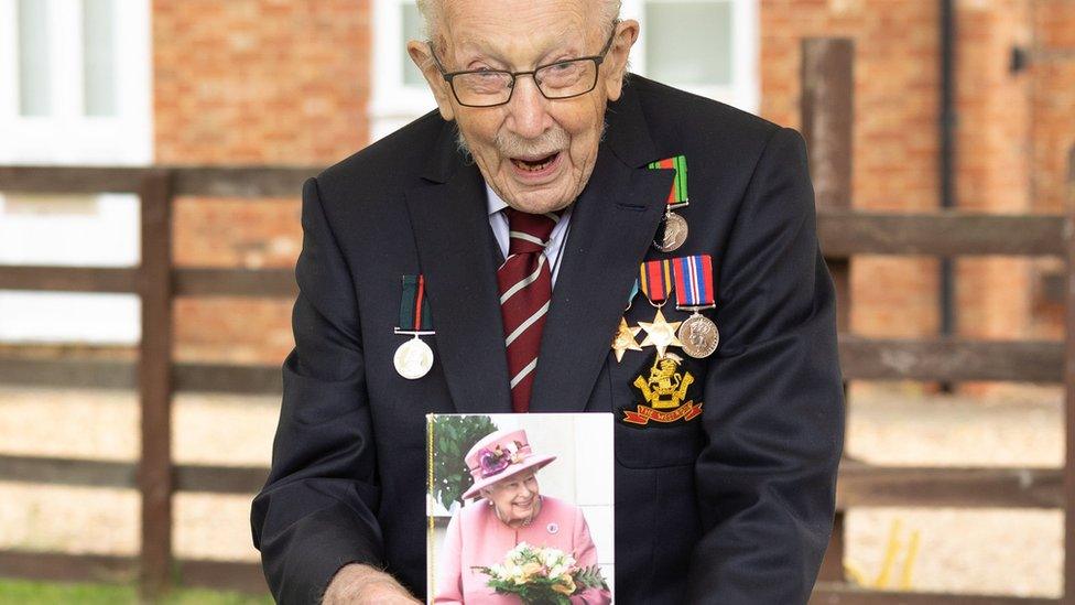 Capt Tom Moore and his card from the Queen