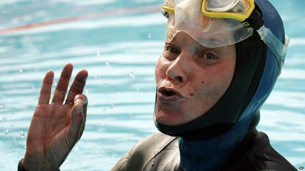 Molchanova reacts after setting a new world record - holding her breath underwater for 7 minutes and 16 seconds - at the first Individual World Freediving Championship in Pool, in Renens near Lausanne, Switzerland, on 26 August 2005