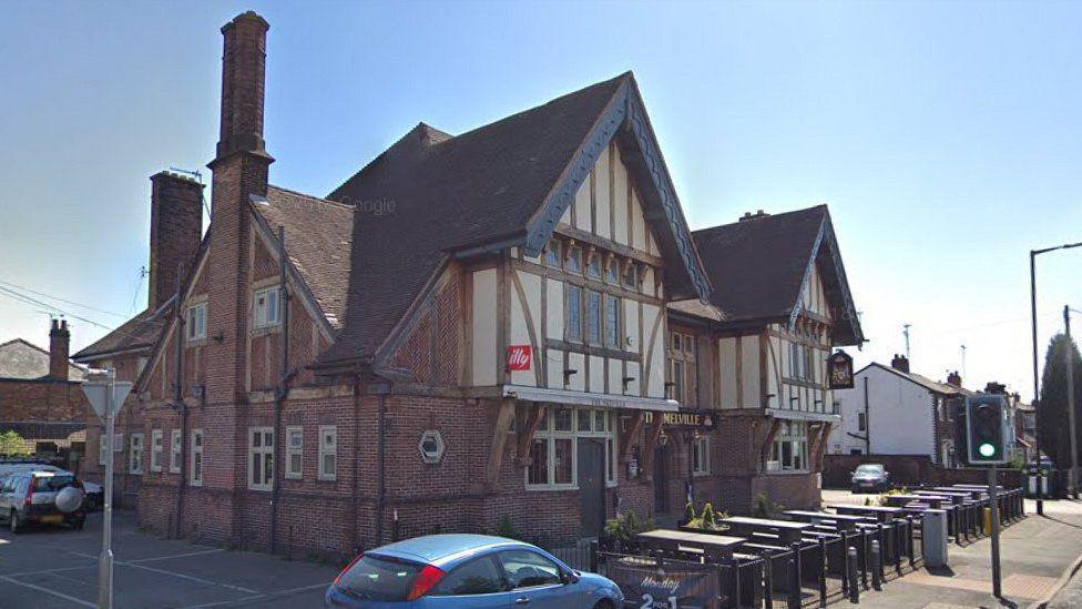 The Melville Hotel, a large double-fronted building with a Victorian style facade