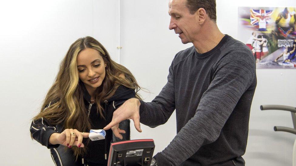 Jade Thirlwall having her heart-rate tested