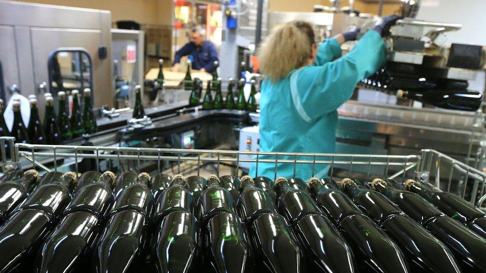 An employee works at the Pol Roger Champagne factory in Epernay, eastern France