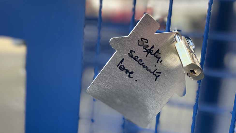 A padlock with the message safety, security, love