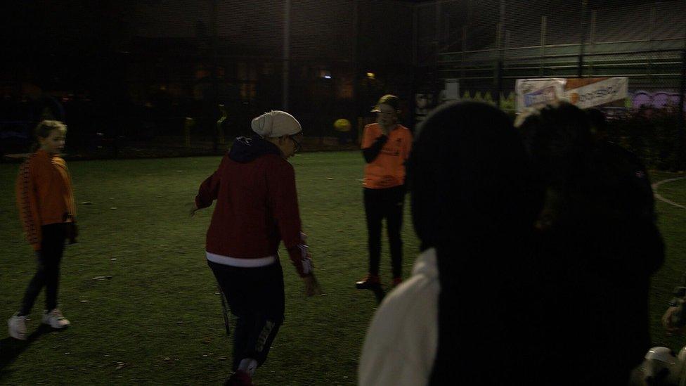 Girls playing football