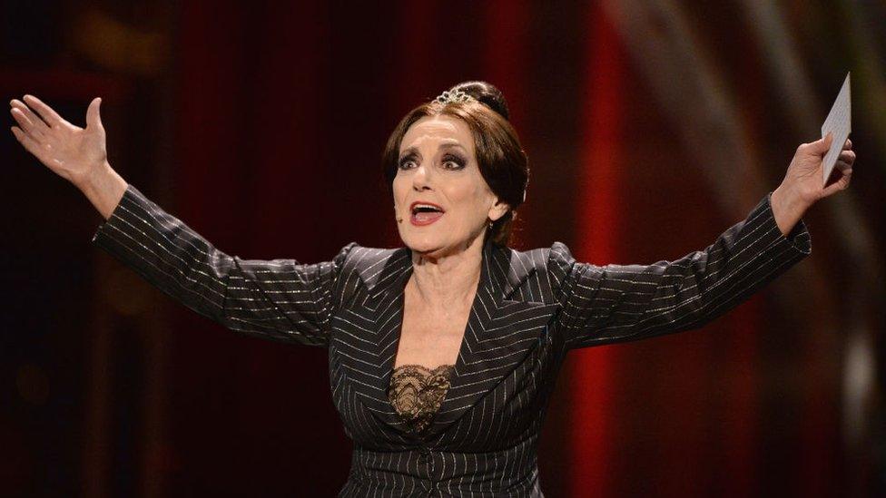 LONDON, ENGLAND - APRIL 08: Lesley Joseph performs on stage with the cast of Young Frankenstein during The Olivier Awards with Mastercard at Royal Albert Hall on April 8, 2018 in London, England.