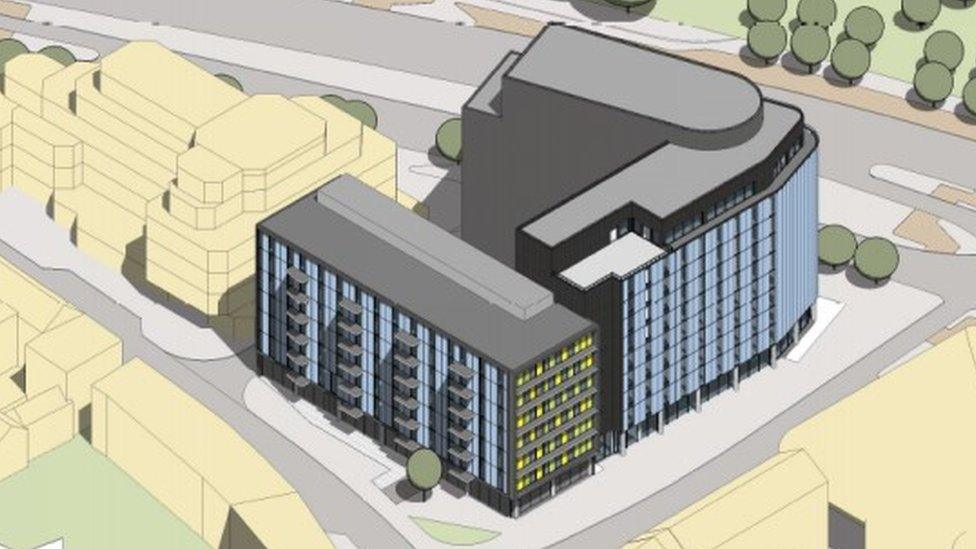 An artist's impression of the hotels and new homes at the site