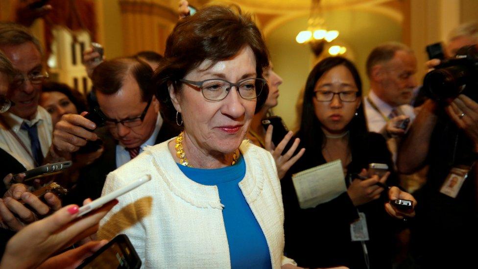 US Senator Susan Collins talks to reporters as she arrives for a Senate healthcare vote on Capitol Hill