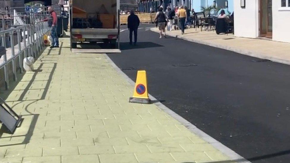 The new surface of the walkway in Custom House Quay has received mixed reactions