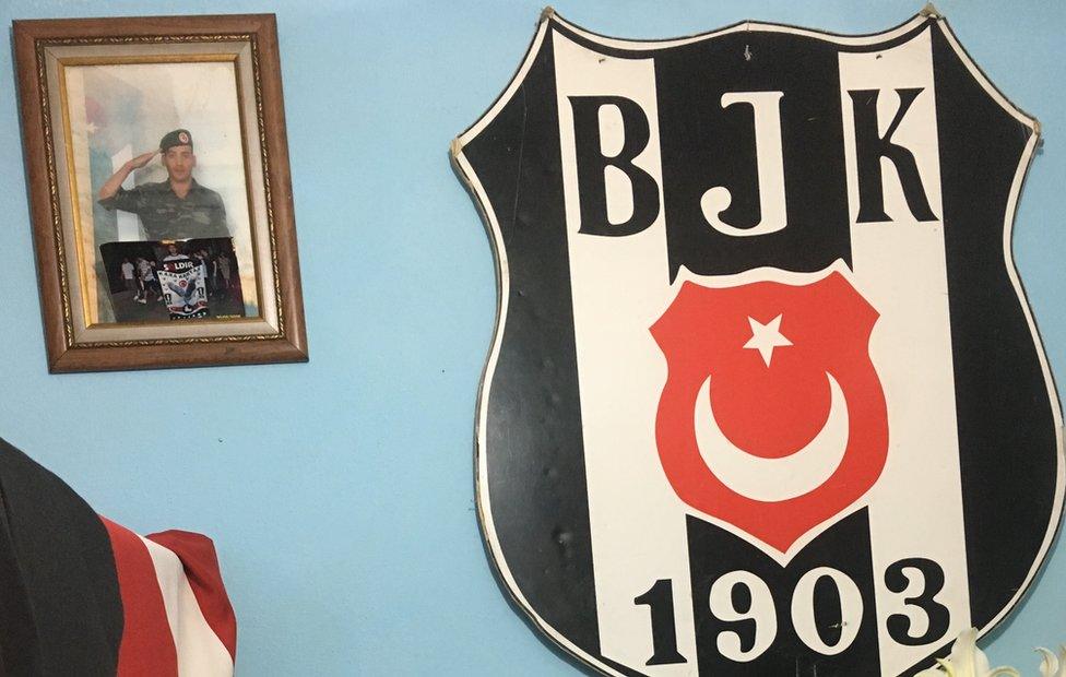 Bedroom wall with football club shield