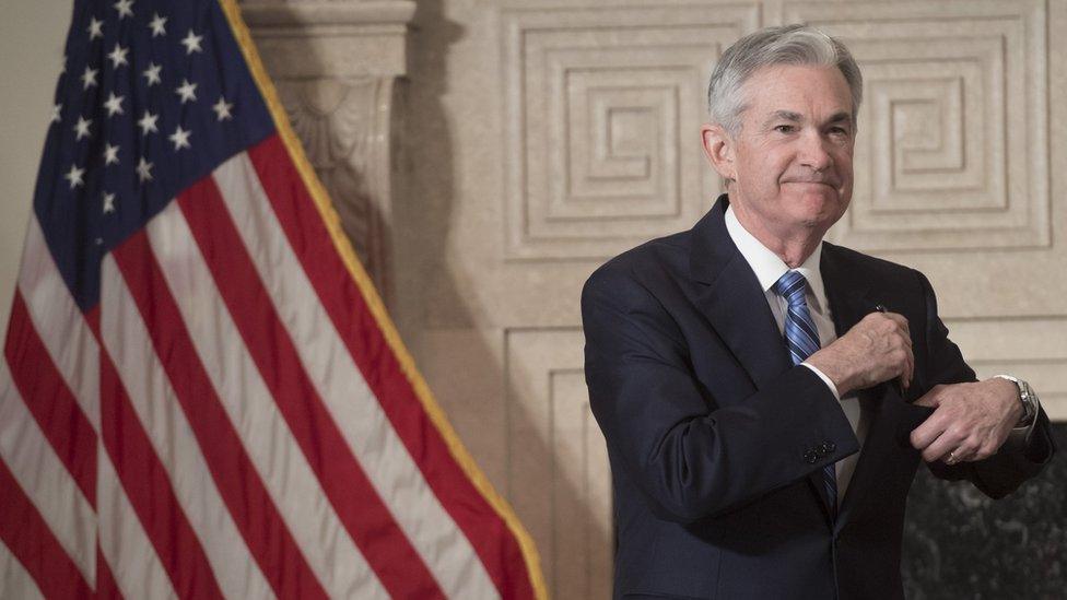 Jerome Powell arrives to takes the oath of office as he is sworn-in as the new Chairman of the Federal Reserve (FED) at the Federal Reserve Building in Washington, DC, February 5, 2018.