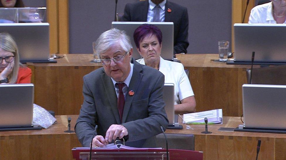 Mark Drakeford answering First Minister's Questions in the Senedd