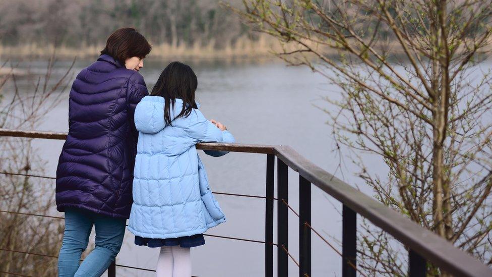 Mother and daughter talking