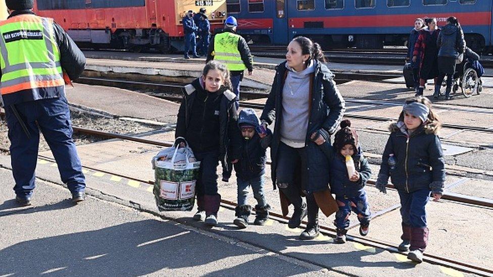 Ukrainian refugees arrive from their homeland at Zahonyi railway station close to the Hungarian-Ukrainian border