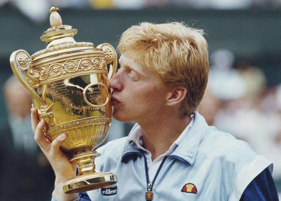 Boris Becker with the Wimbledon trophy in 1985