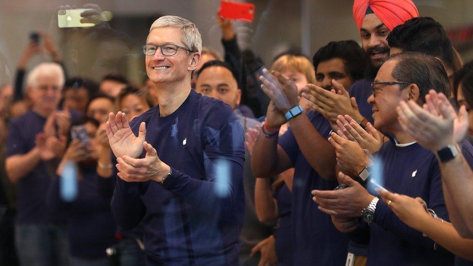 Apple CEO Tim Cook prepares to greet customers that will purchase a new iPhone X at an Apple Store on November 3, 2017 in Palo Alto, California. The highly anticipated iPhone X went on sale around the world today.