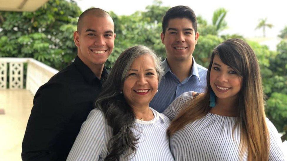 Photograph of Carla, her mother and two brothers