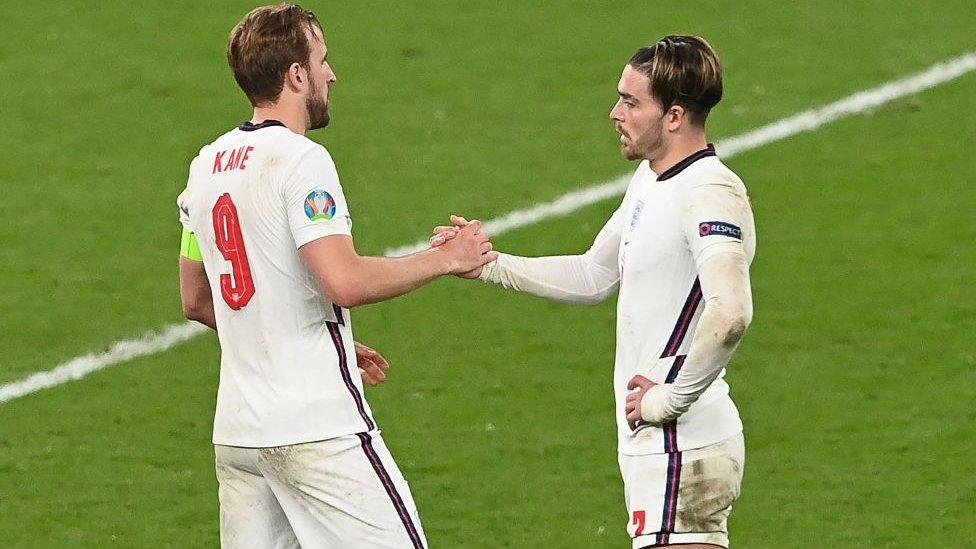 Harry Kane and Jack Grealish playing for England.