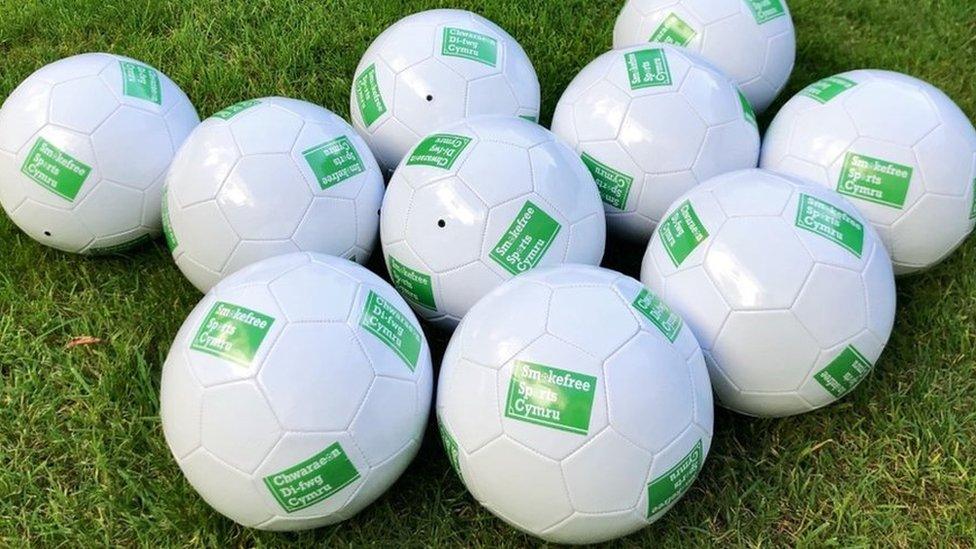 Footballs with the message 'smoke free'