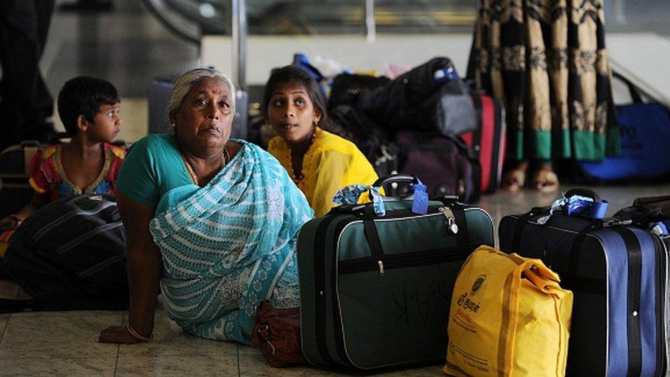 Sri Lankan refugees arrive home after returning from India in Katunayake in 2015.