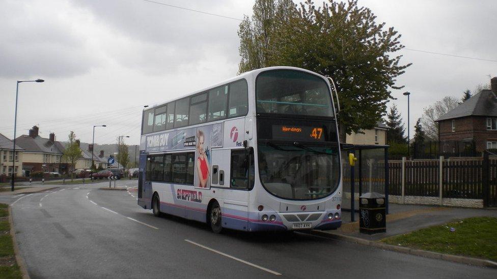 First Bus halted at a bus stop