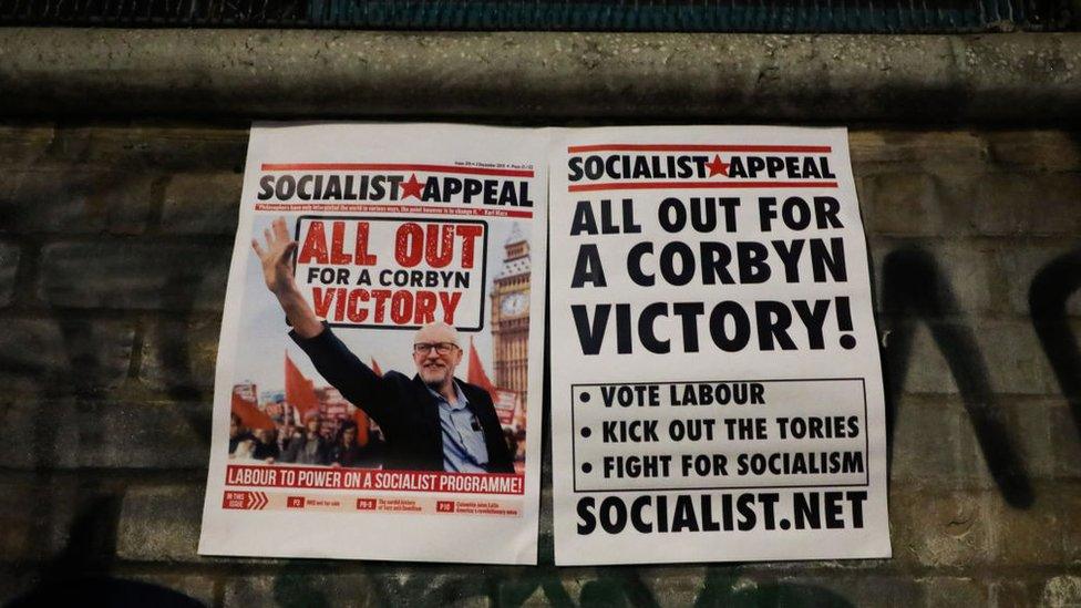 Posters at Labour leader Jeremy Corbyn's final rally in Hoxton, London