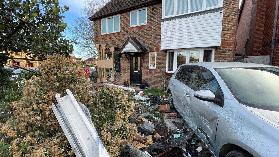 The scene after a car crashed into a house in Grays