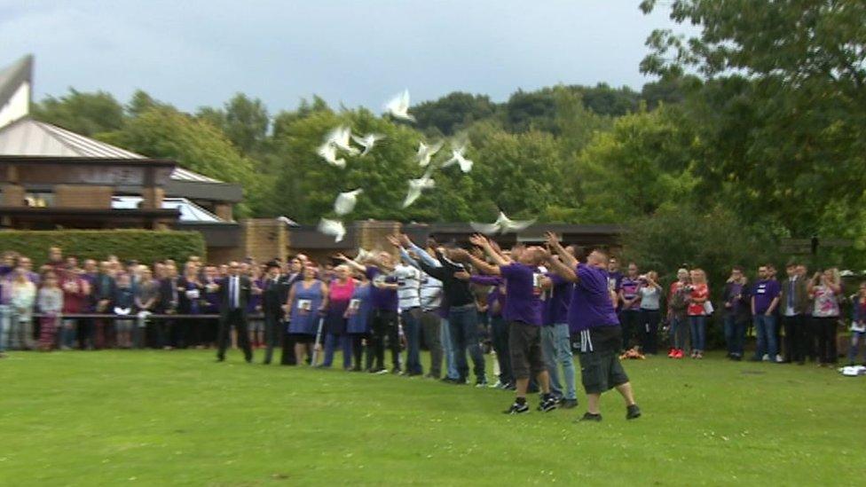 Doves being released into the air