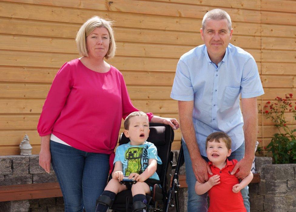 Liz McMahon and David Ryan with Luke and Seán