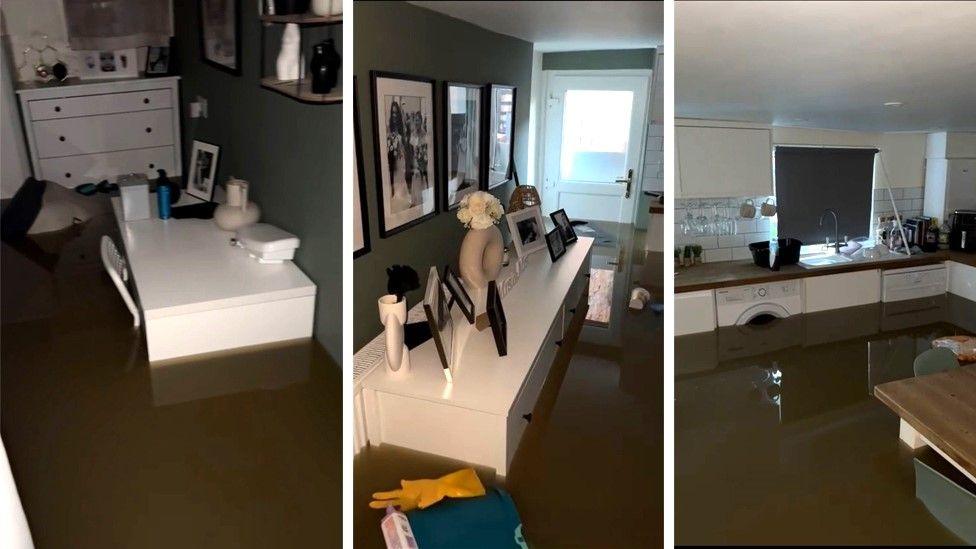 A montage of three rooms in the flooded basement. In each picture, murky brown water comes up about 3ft from the floor. A bedroom with a white desk and chest of drawers is flooded. A hallway with a white storage cabinet is also flooded, you can see a yellow rubber glove floating on the water. Framed photos are on the wall and on the cabinet. A kitchen is badly flooded with water almost to the top of the washing machine and dishwasher. 