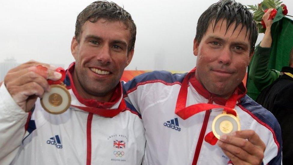 Iain Percy (left) and Andrew "Bart" Simpson with their Olympic gold medals for the Star class at Beijing 2008