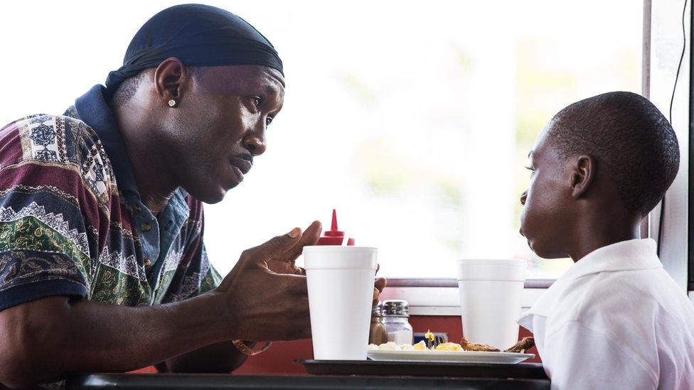 Mahershala Ali with Alex Hibbert in Moonlight