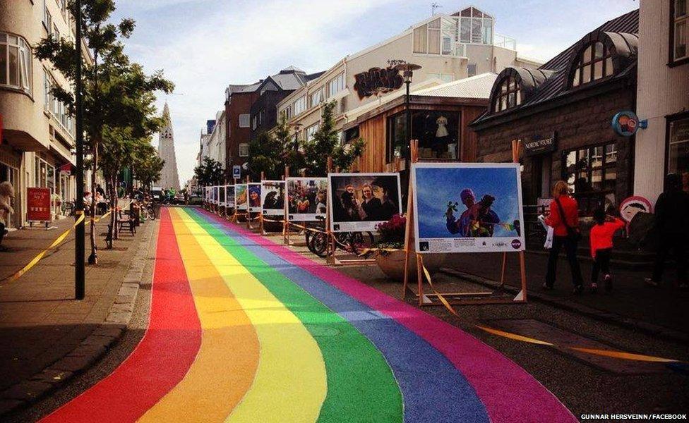 A view of the street painted in rainbow colours