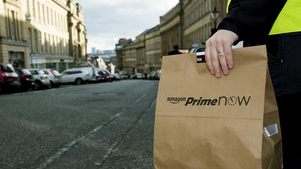 Amazon Prime Now packages being delivered