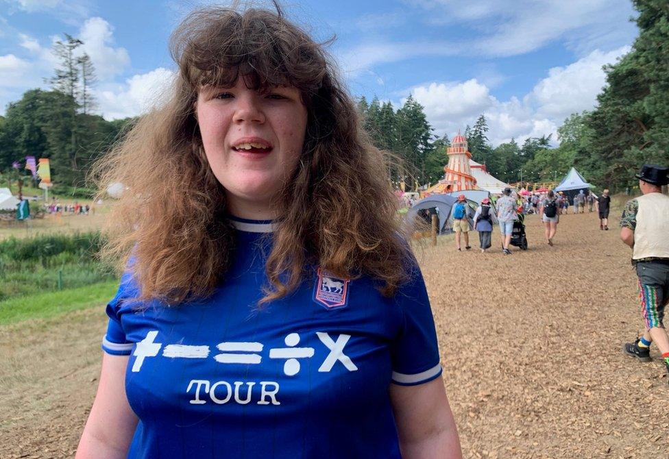 Elena Knighton in an Ipswich Town shirt at Latitude