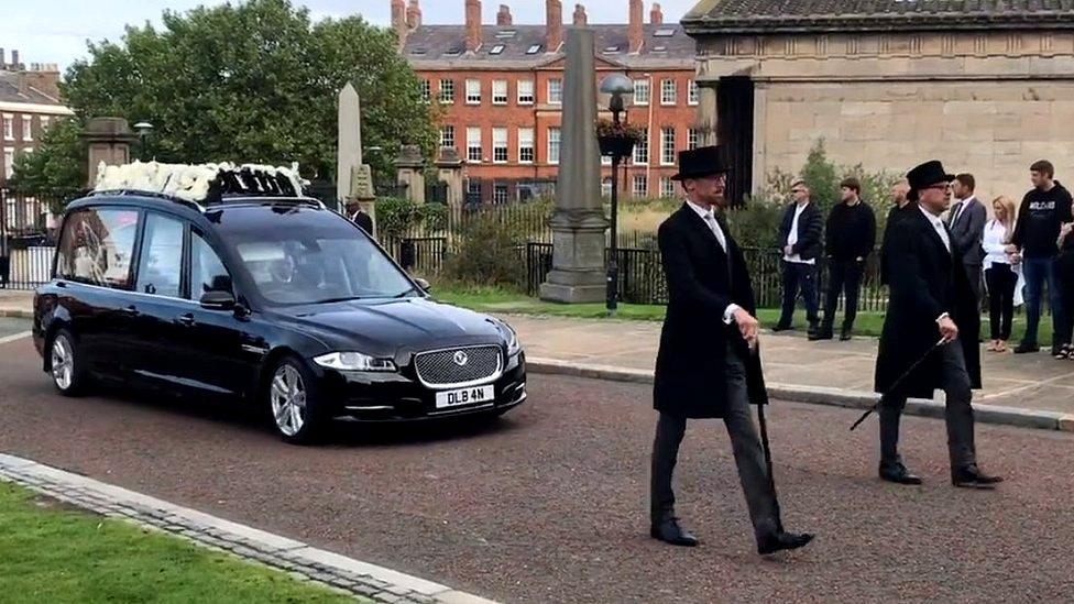 Hearse carrying coffin of Ashley Dale to Liverpool Cathedral