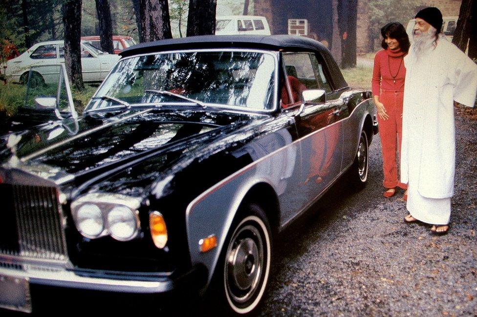 Sheela and Bhagwan with one of his Rolls Royces