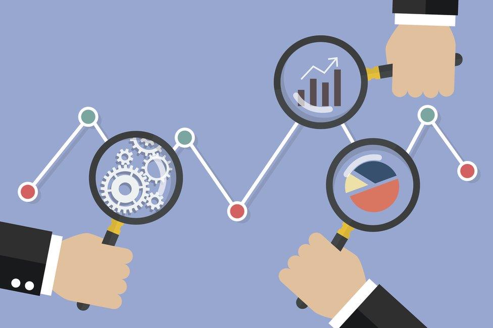 Magnifying glasses analysing data