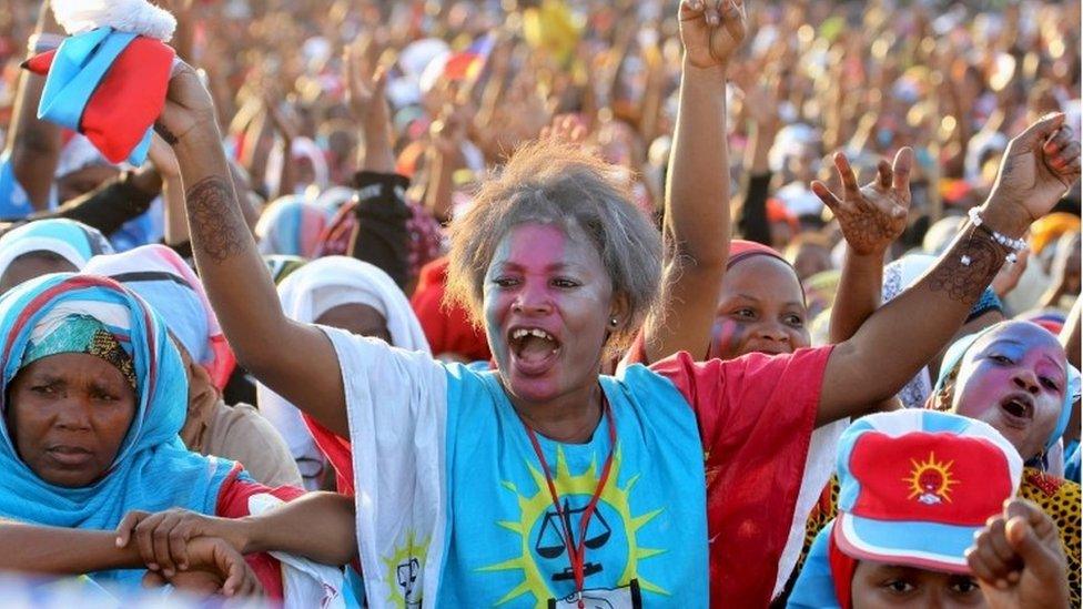 A supporter of former Tanzania's Prime Minister Edward Lowassa cheers during his campaign rally in Tanga October 21, 2015