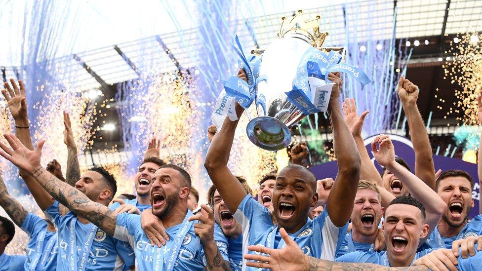 City lifting trophy