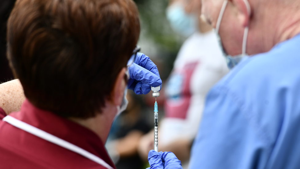 A Walk-in Covid vaccine clinic at Belfast City Hall in July