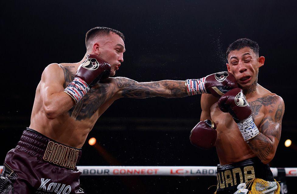 Sam Goodman of Australia punches Cesar Vaca Espinoza of Mexico during their super-bantamweight world title eliminator fight. Photo by Darrian Traynor