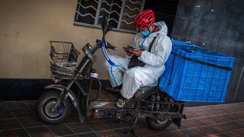 Delivery rider on the streets of Shanghai