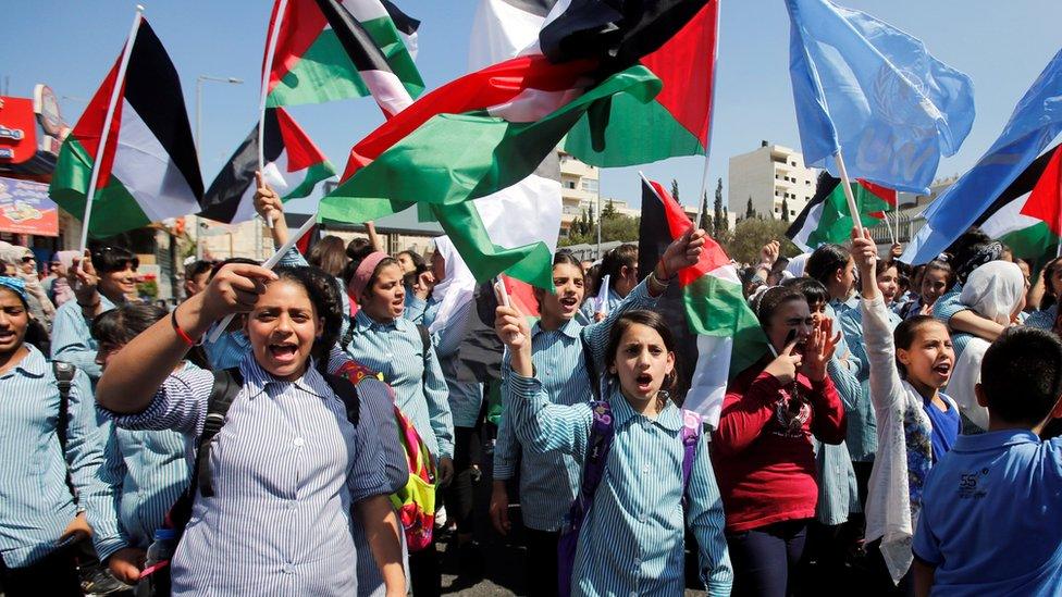 Palestinian schoolgirls protest against US decision to cut funding to Unrwa in Bethlehem, in the occupied West Bank (26 September 2018)