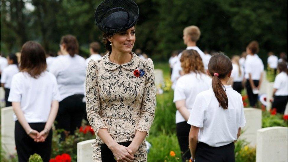 The Duchess of Cambridge surrounded by schoolchildren at the Commonwealth War Graves Commission Memorial