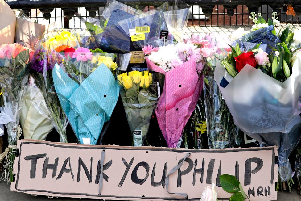 Floral tributes are seen at Buckingham Palace