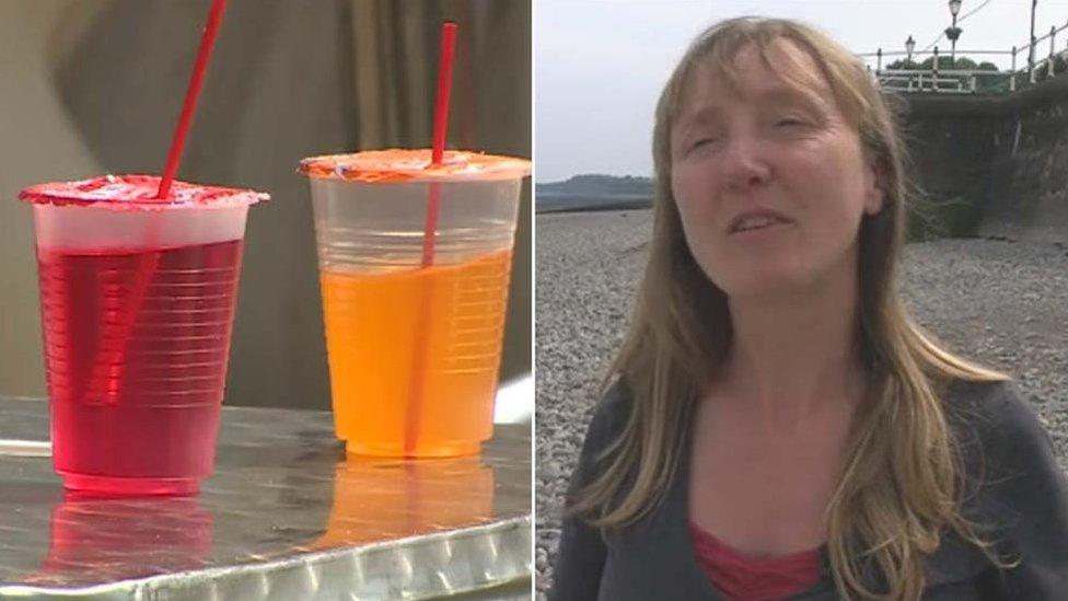 Gill Bell of the Marine Conservation Society in Wales and two plastic drink cartons