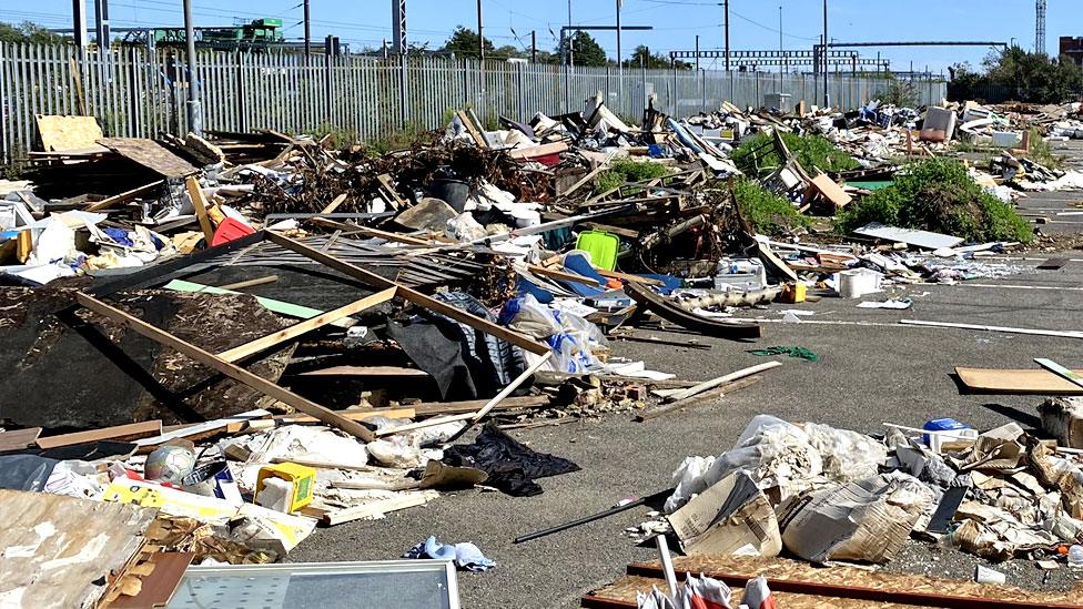 Waste dumped in a car park