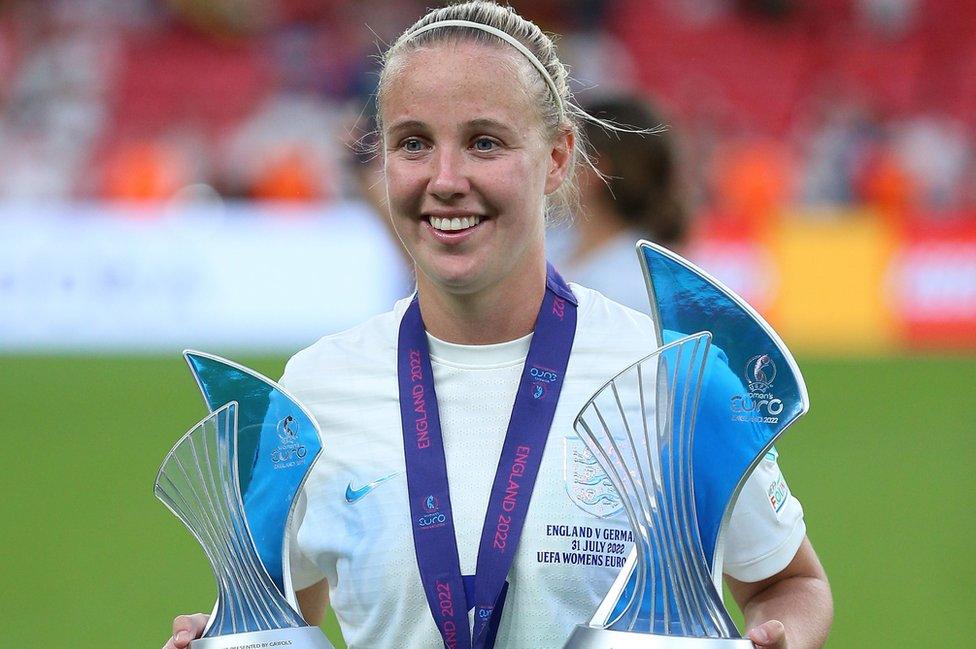 Beth Mead holds the player of the tournament and top goal scorer trophies